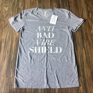 Luciana “Anti bad vibe shield” T